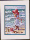 Девчушка на пляже