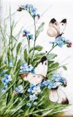 Бабочки и голубые цветы